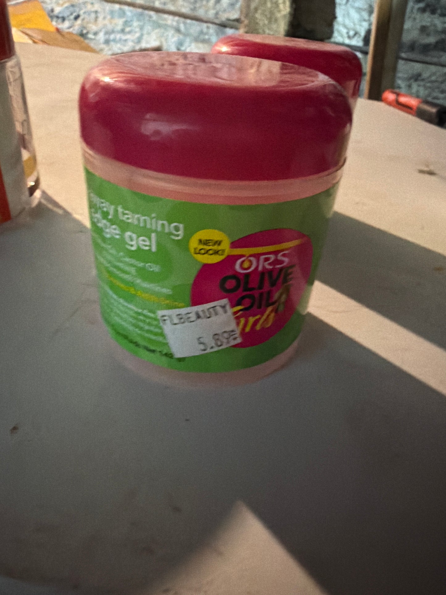 ORS Olive Oil Girls Fly-Away Taming Edge Gel 5 oz